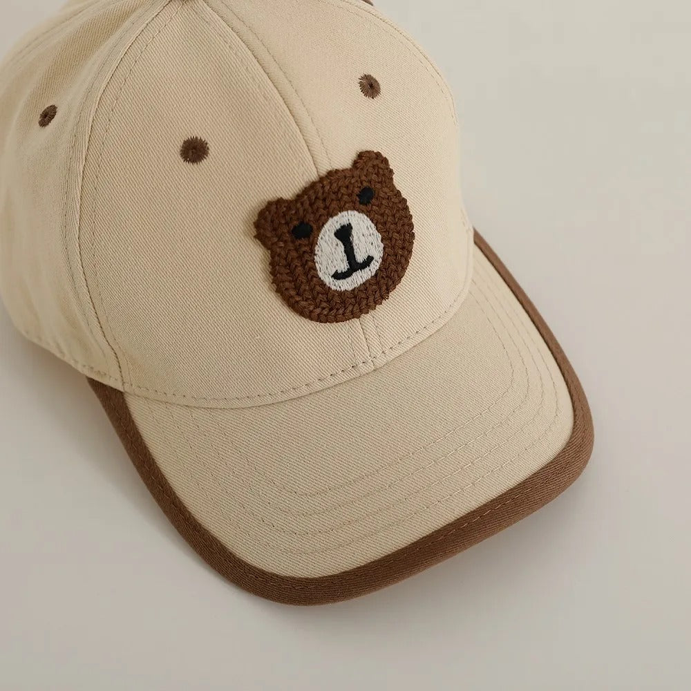 Unisex baby sun cap β Ju Ju Jam Arlo cap with wide brim for sun protection.