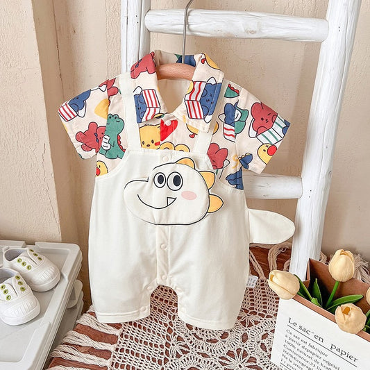 Baby in Baby Jurassic Joy Romper by Ju Ju Jam β fun dinosaur-themed baby outfit