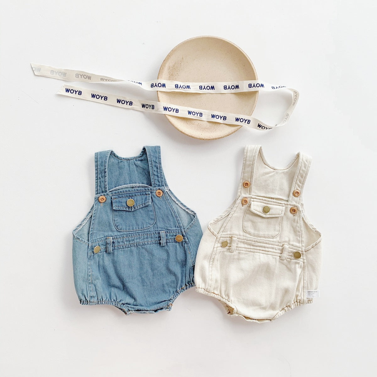 Ju Ju Jam baby romper – gender-neutral denim one-piece and cap combo for infants and toddlers.