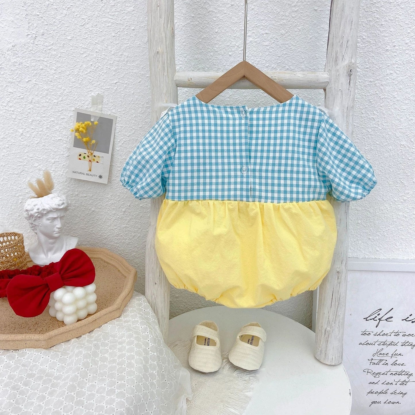 Baby girl dressed in Disney Snow White romper set – Ju Ju Jam outfit