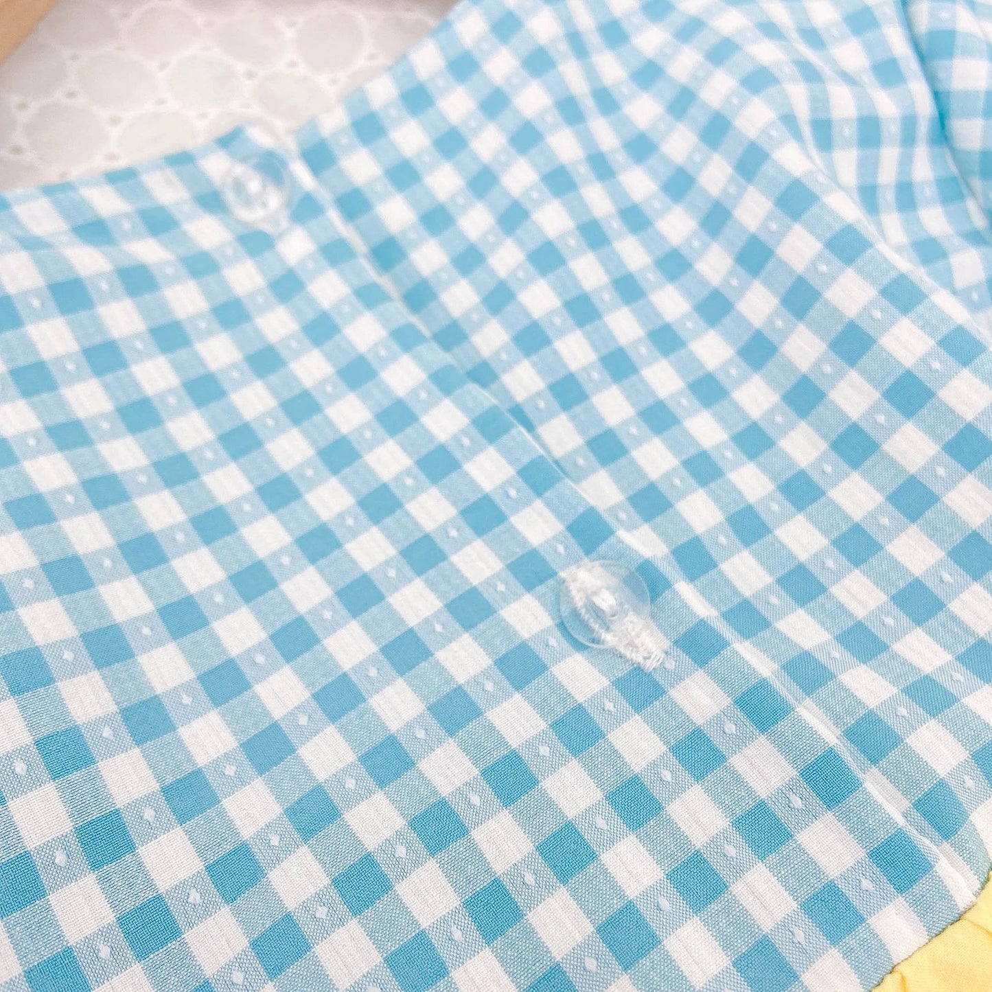 Close-up of Snow White baby outfit with bow headband – Ju Ju Jam