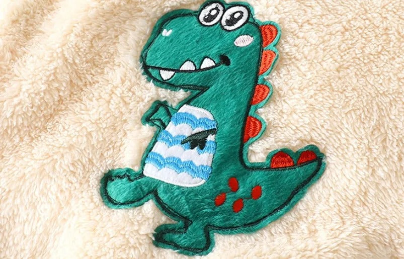 Ju Ju Jam Cozy Dino Boys and Girls Plush Set β a cuddly and stylish outfit for little dino enthusiasts.
