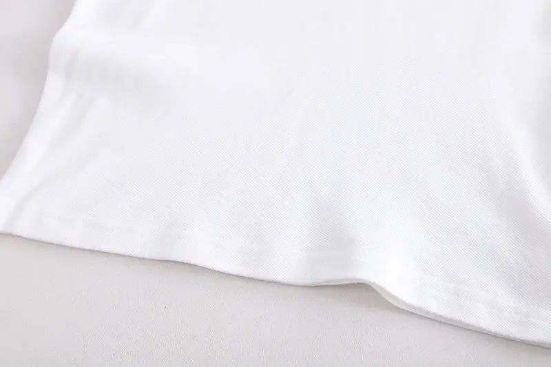 Boy smiling in Hey Dino Shorts with Bright T-shirt Boys Set by Ju Ju Jam