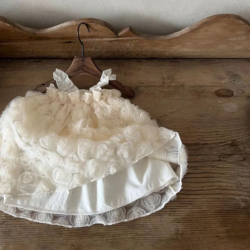 Rosy Bloom Girls Princess Dress by Ju Ju Jam – Trendy floral princess dress for baby girls. Perfect for special events, birthdays, and photoshoots. Soft, breathable fabric ensures comfort for toddlers and young girls.