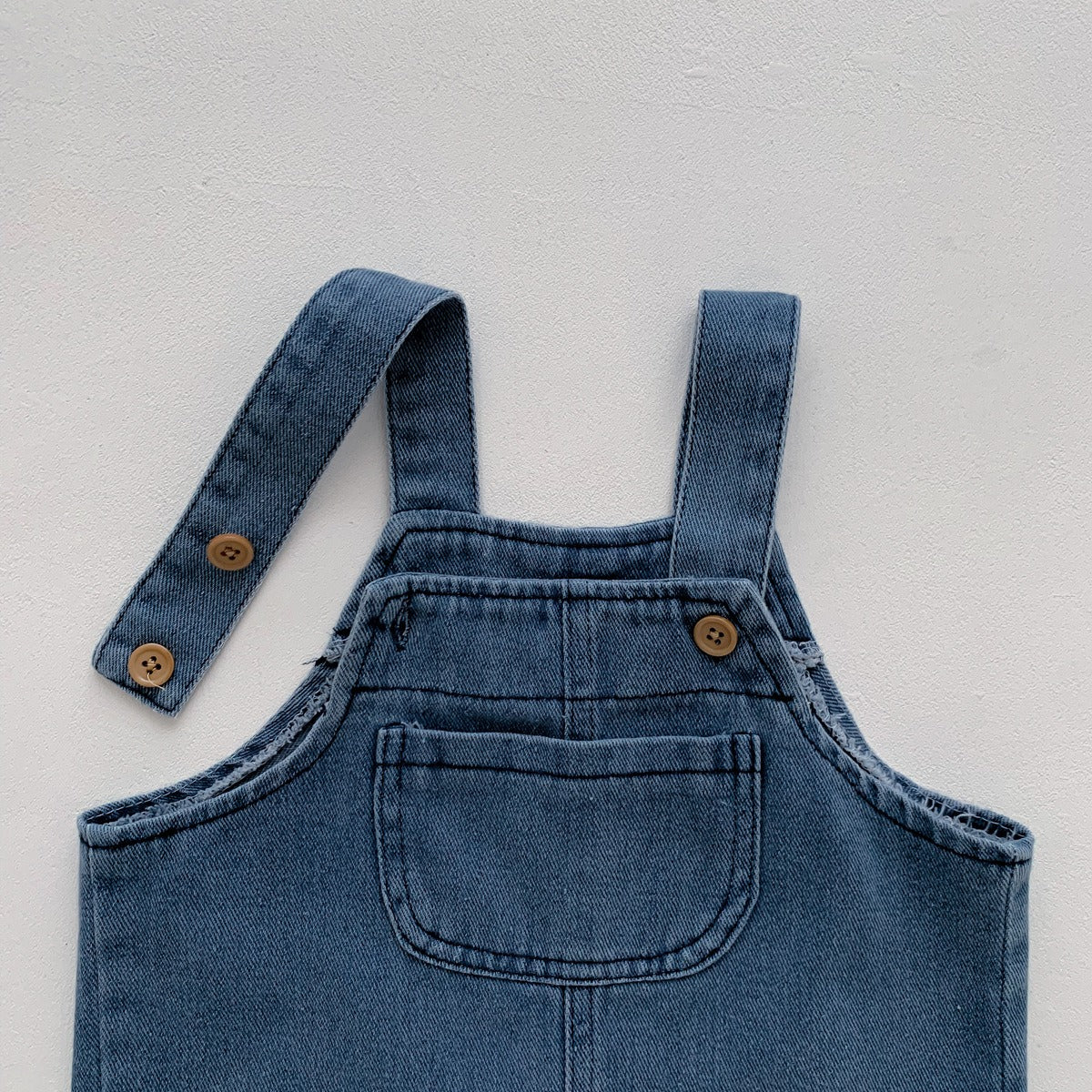 Cute and comfy baby jumpsuit β Little Denim design by Ju Ju Jam for boys and girls.