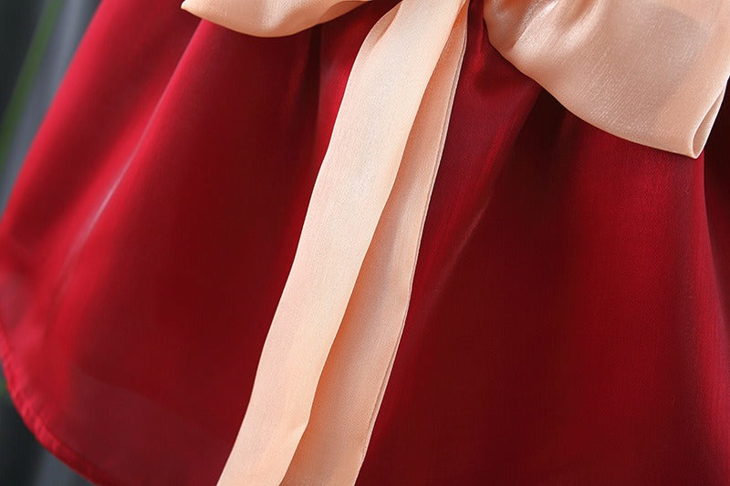 Baby girl twirling in Ju Ju Jam’s Melody Bow Dress – lightweight and playful party attire