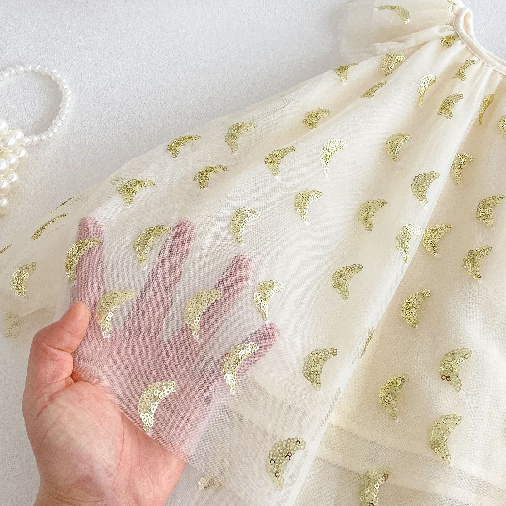 Smiling baby girl wearing Ju Ju Jam’s Nyla Party Princess Dress – perfect for birthdays or celebrations