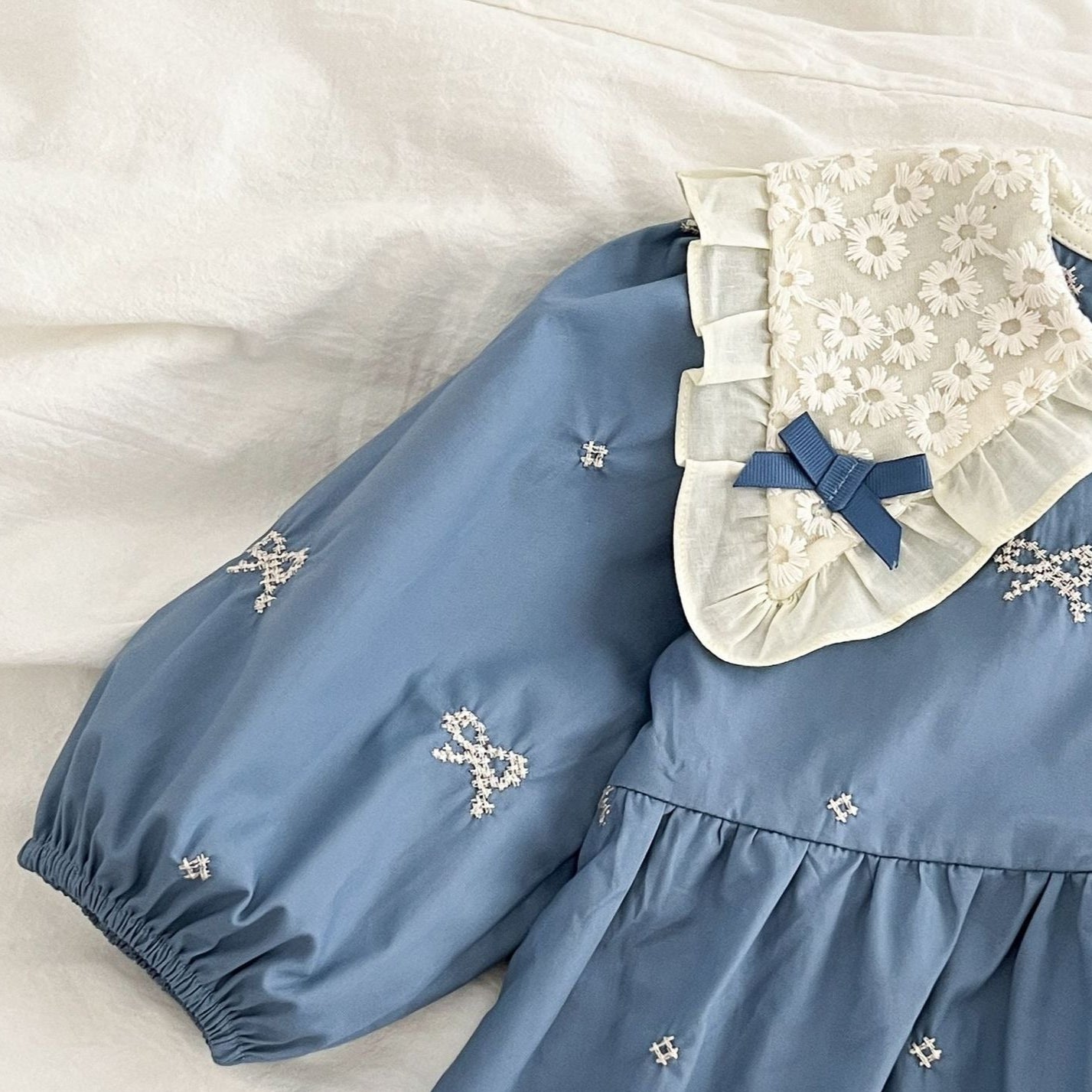 Chic and airy balloon romper for baby girls in pastel blue – Ju Ju Jam baby fashion.