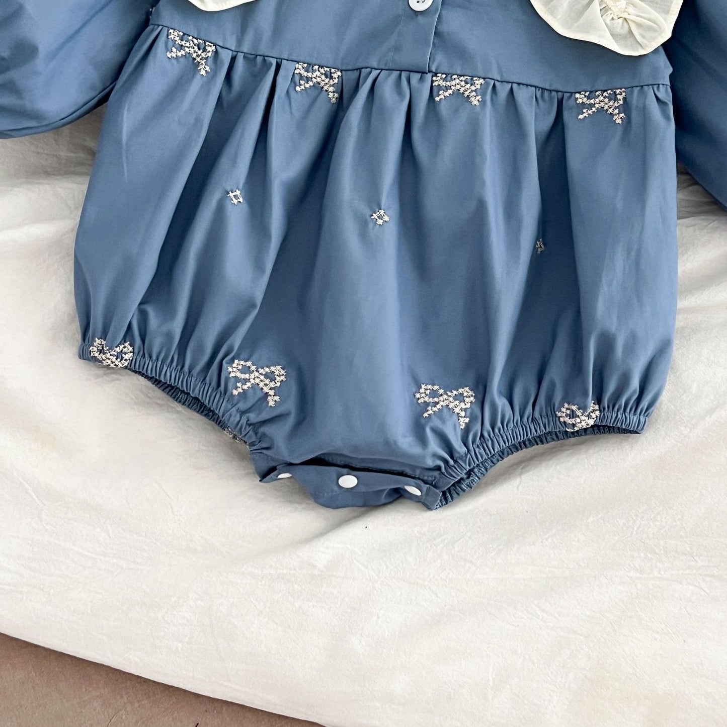 Aesthetic ice blue romper with elastic waist and sleeves for baby girls – Ju Ju Jam.