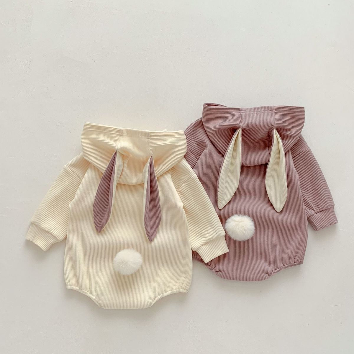 Ju Ju Jam bunny-themed onesie β hooded baby romper with cute rabbit tail for boys and girls.