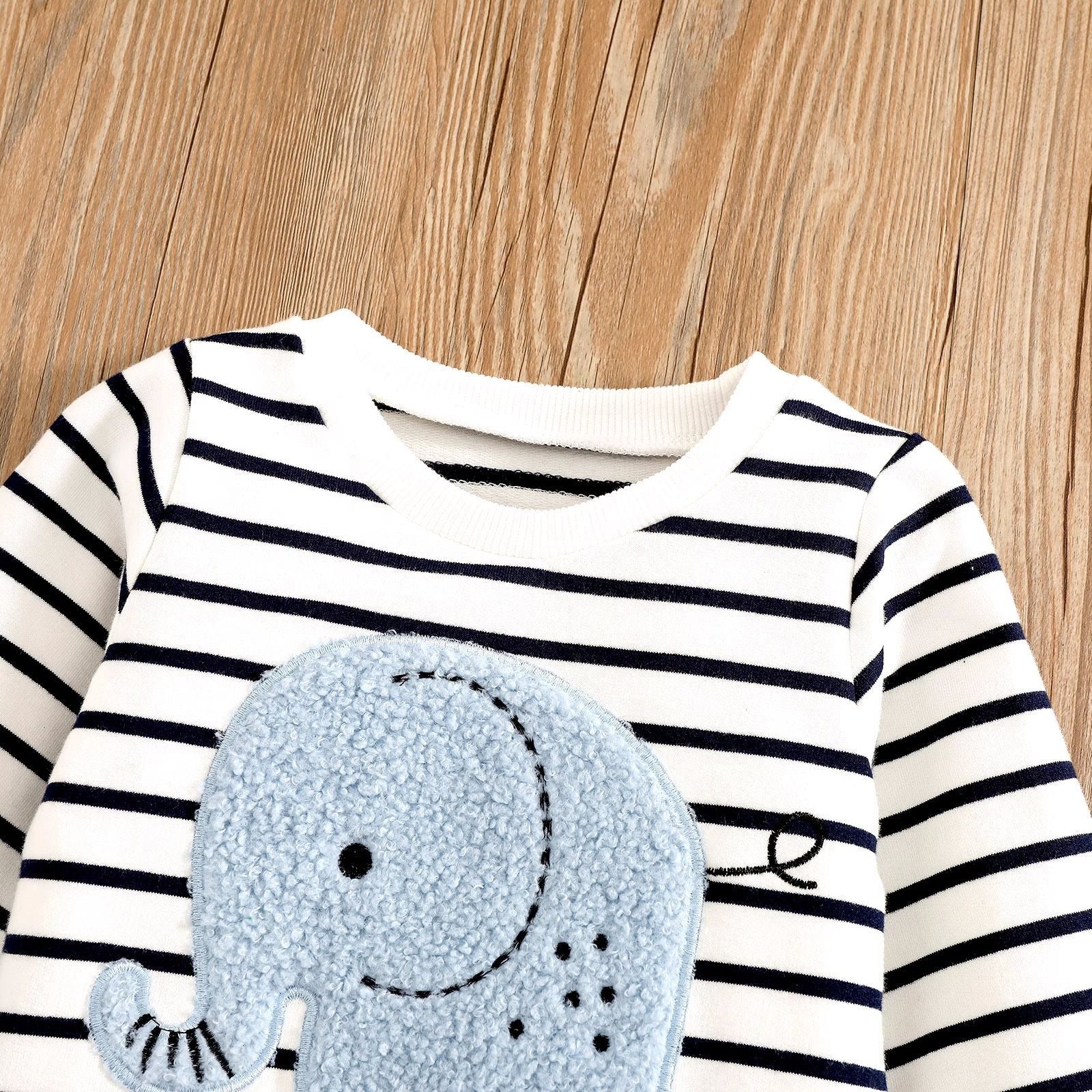 Baby boy outfit with elephant motif β Ju Ju Jamβs Lil Elephant tee and jeans for everyday style.