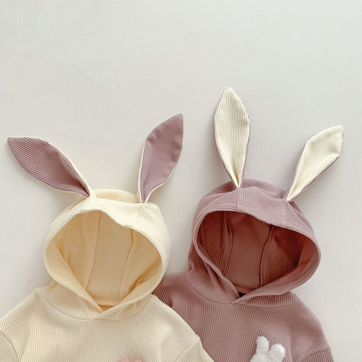Rabbit Tail hooded baby romper β cozy and charming onesie for boys and girls from Ju Ju Jam.