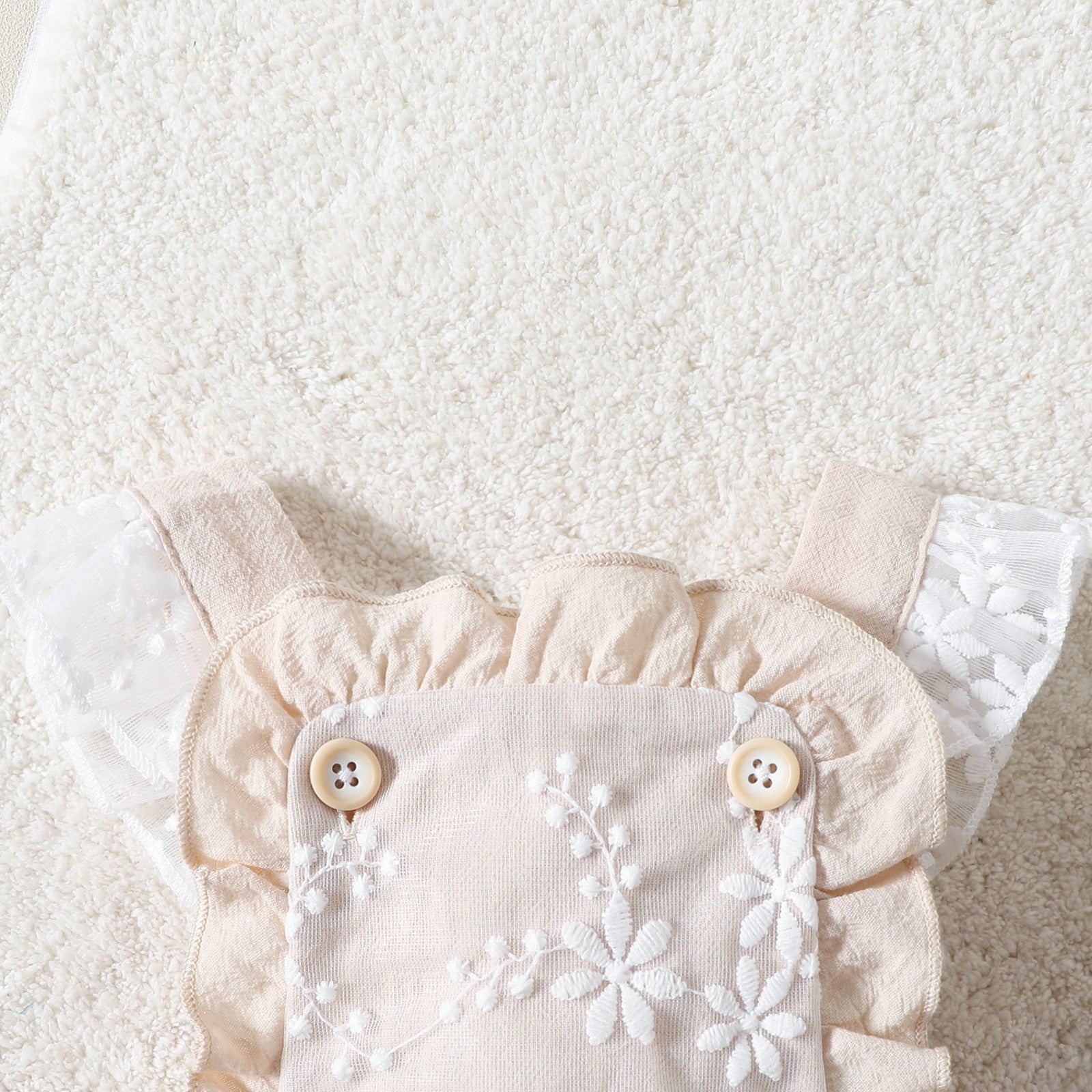 Infant girl wearing Pixie Embroidered Romper β elegant partywear designed by Ju Ju Jam for toddlers and babies.