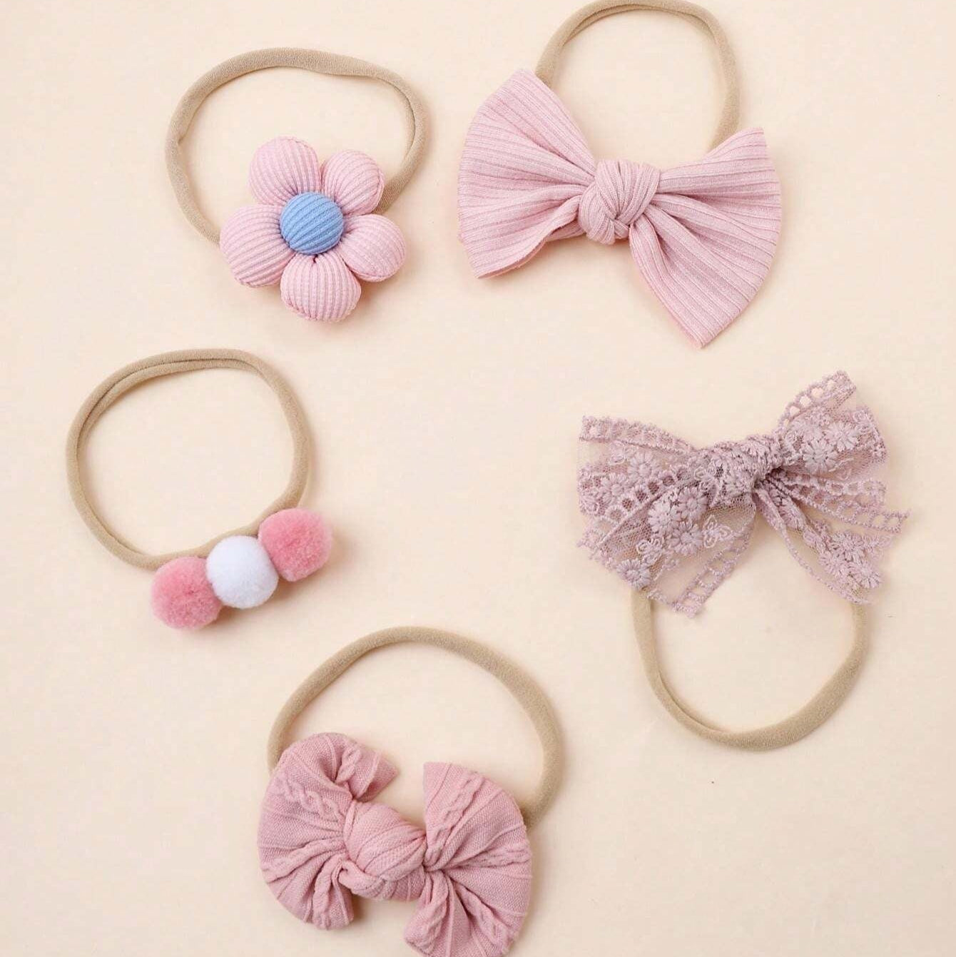Pink baby girl hair accessories set – 5 matching pieces by Ju Ju Jam including clips and bows.