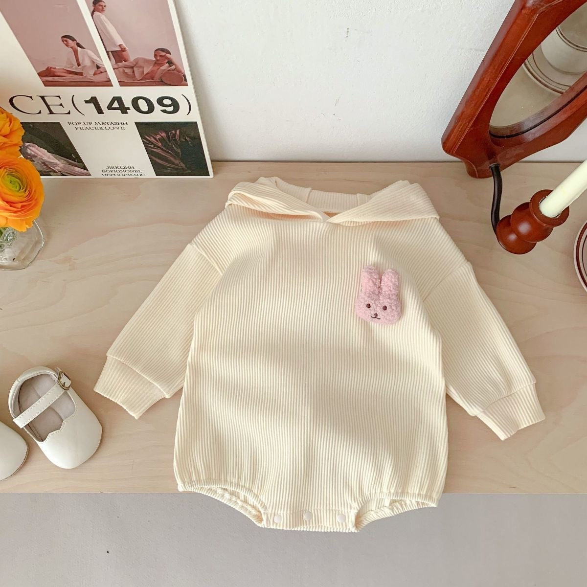 Snuggly bunny romper with hood and tail β gender-neutral onesie by Ju Ju Jam for babies.
