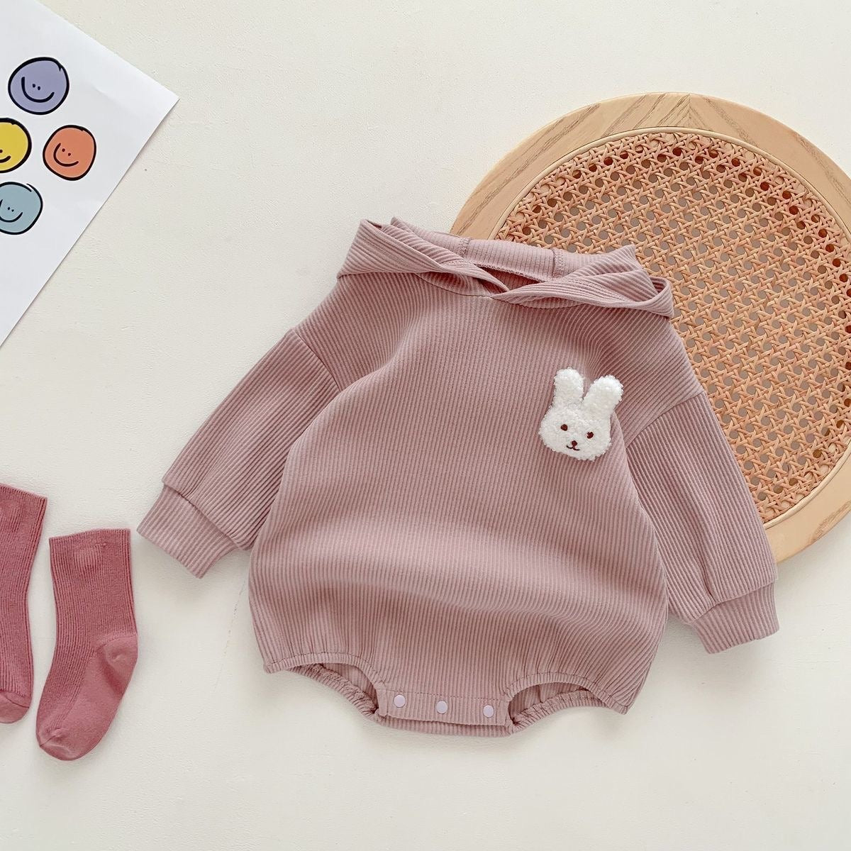 Hooded baby romper with bunny ears and tail β Ju Ju Jam Rabbit Tail Onesie for infants.