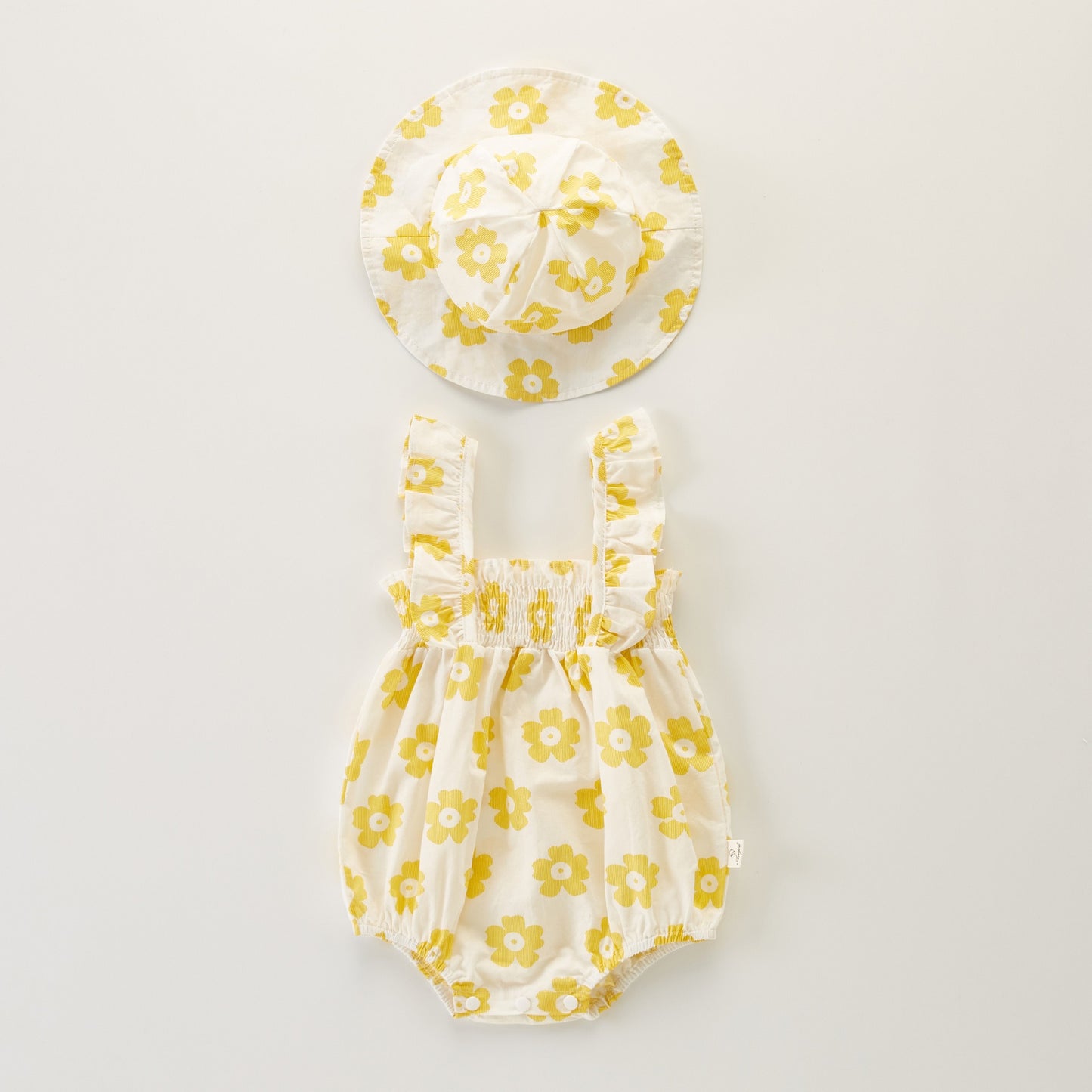Baby girl ruffle romper with coordinating hat – Shine & Ruffle design by Ju Ju Jam