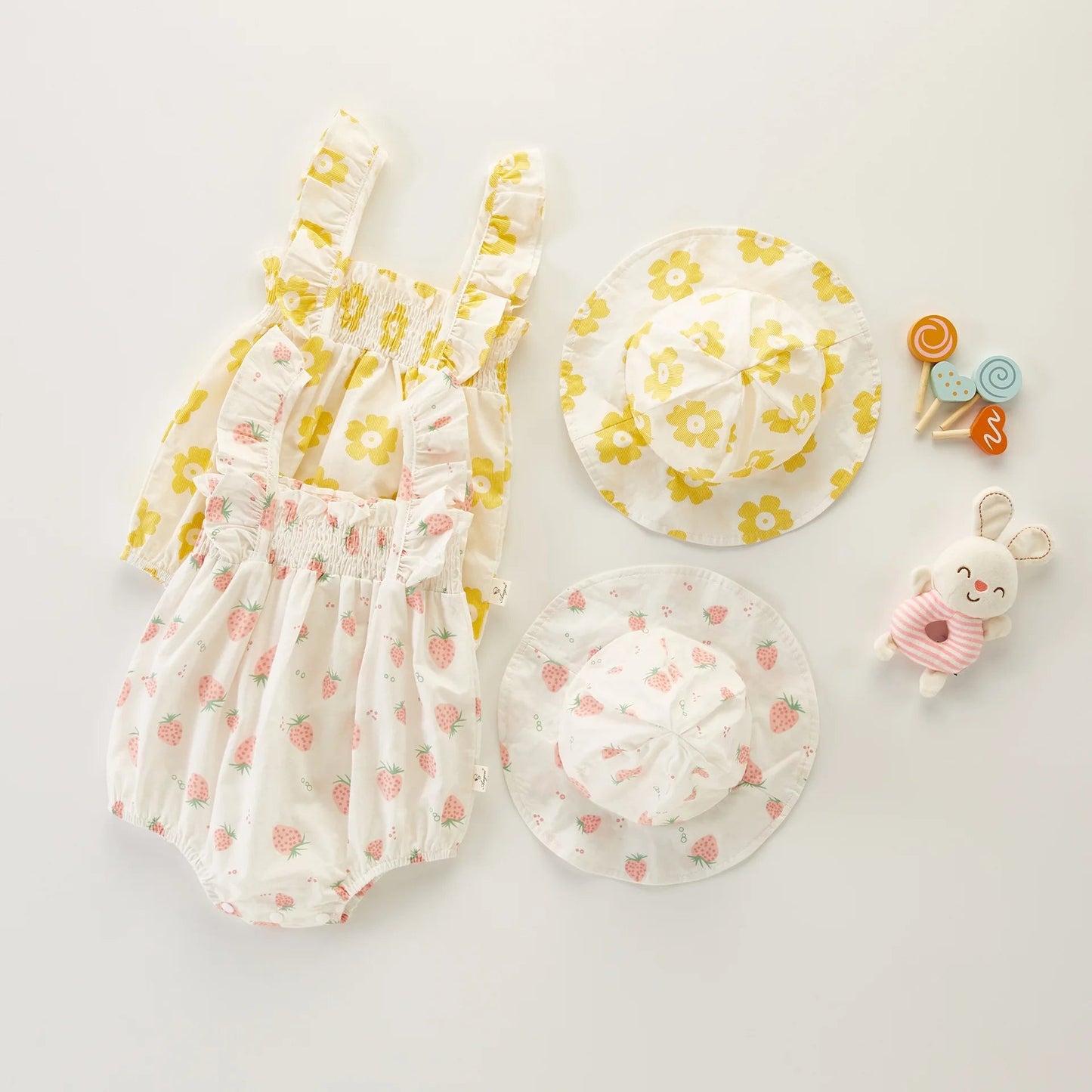 Shiny and ruffled romper with matching hat for baby girls – Ju Ju Jam fashion set