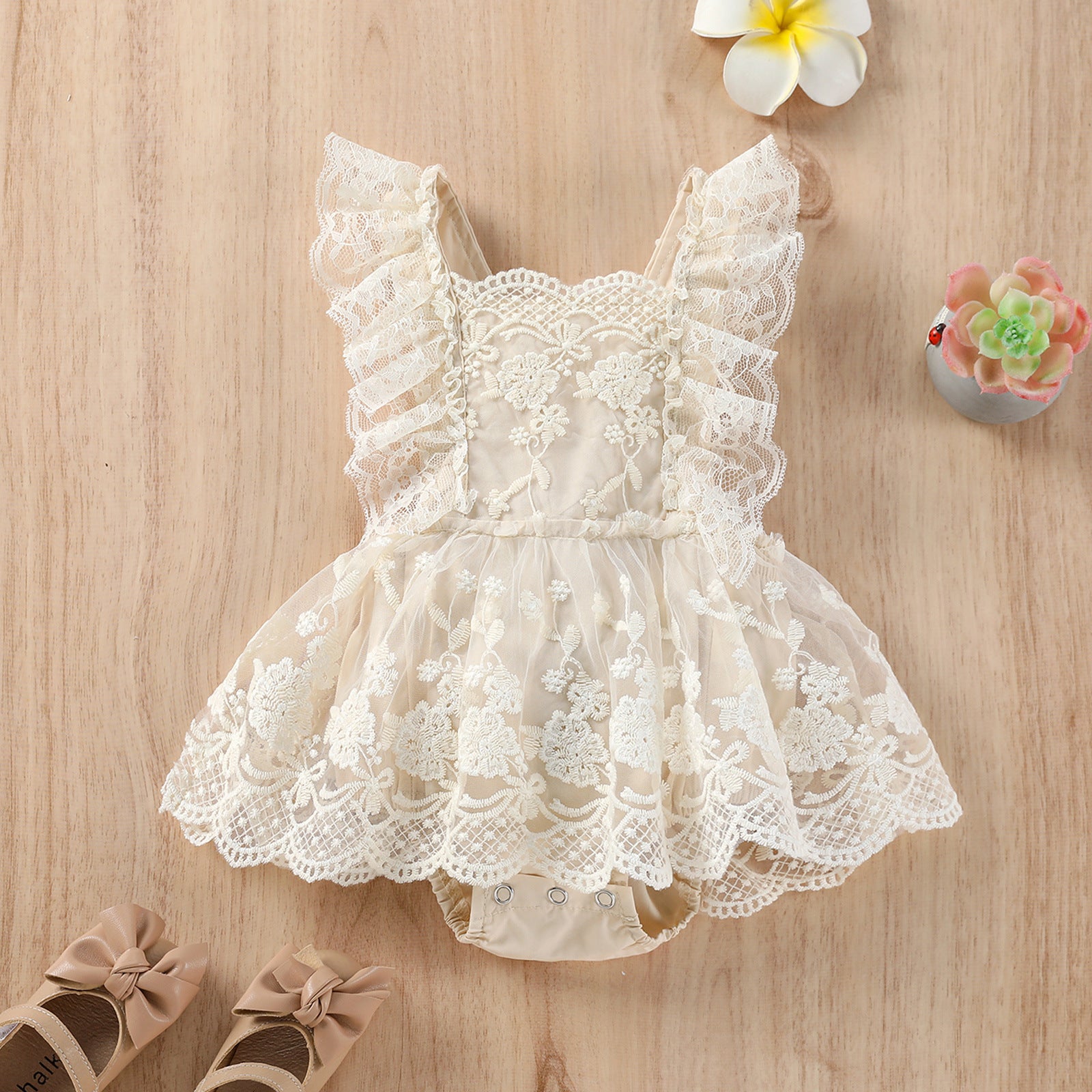 Ju Ju Jam's Sleeveless Lace Romper Suit: Elegant and adorable for little ones