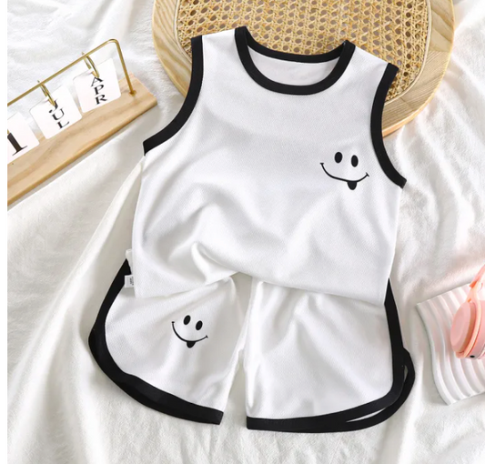 Smiley Black White Two Piece Boys Set - Trendy outfit featuring a cheerful smiley graphic on a black and white two-piece set, perfect for stylish and playful wear, available at Ju Ju Jam