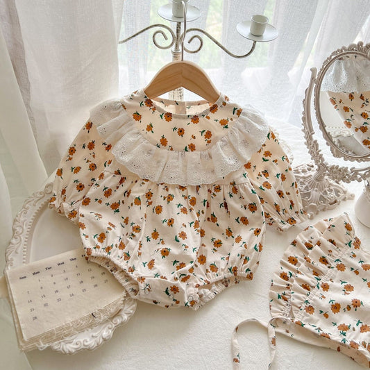 Stella baby girls frill romper with matching cap β soft and stylish outfit by Ju Ju Jam for infants and toddlers.