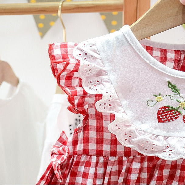 Baby girls one-piece plaid romper – Ju Ju Jam’s strawberry-themed clothing for little ones.