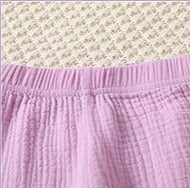 Trendy Knot Girls Set from Ju Ju Jam β Contemporary outfit featuring a knot-front top and matching pants, designed for a fashionable look.