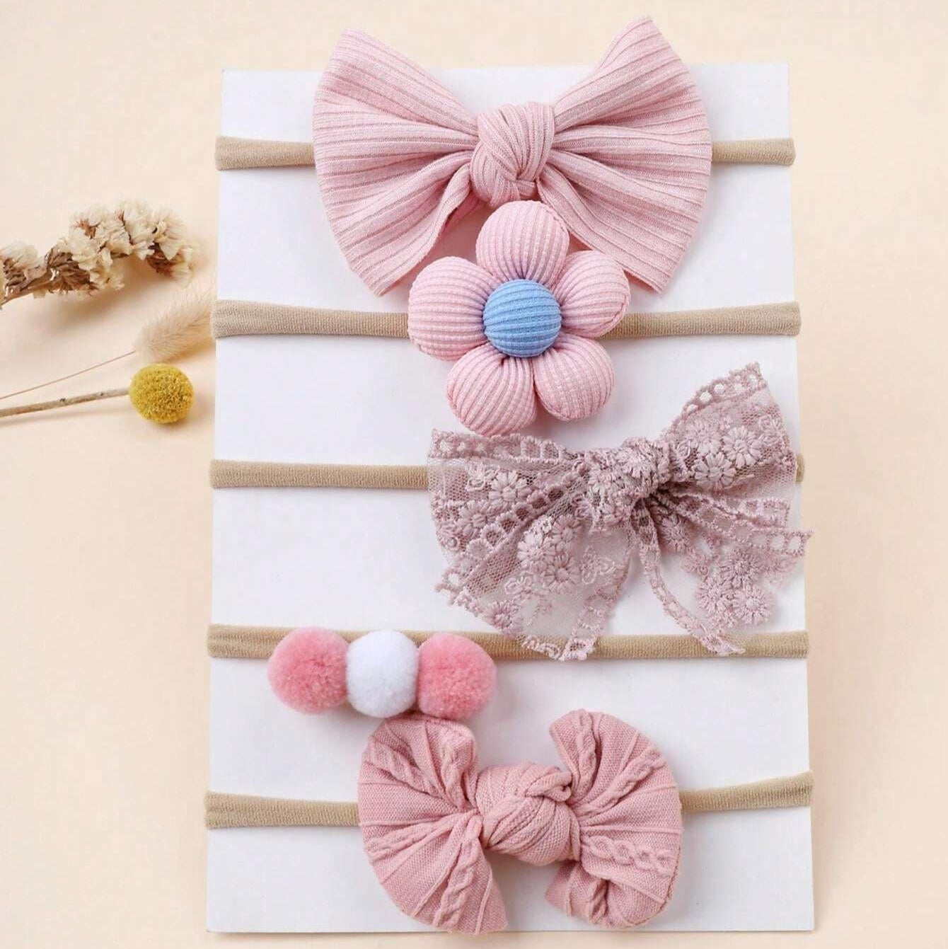 Ju Ju Jam baby girl hair accessory set – pretty pink bows, headbands, and clips for newborns and toddlers.