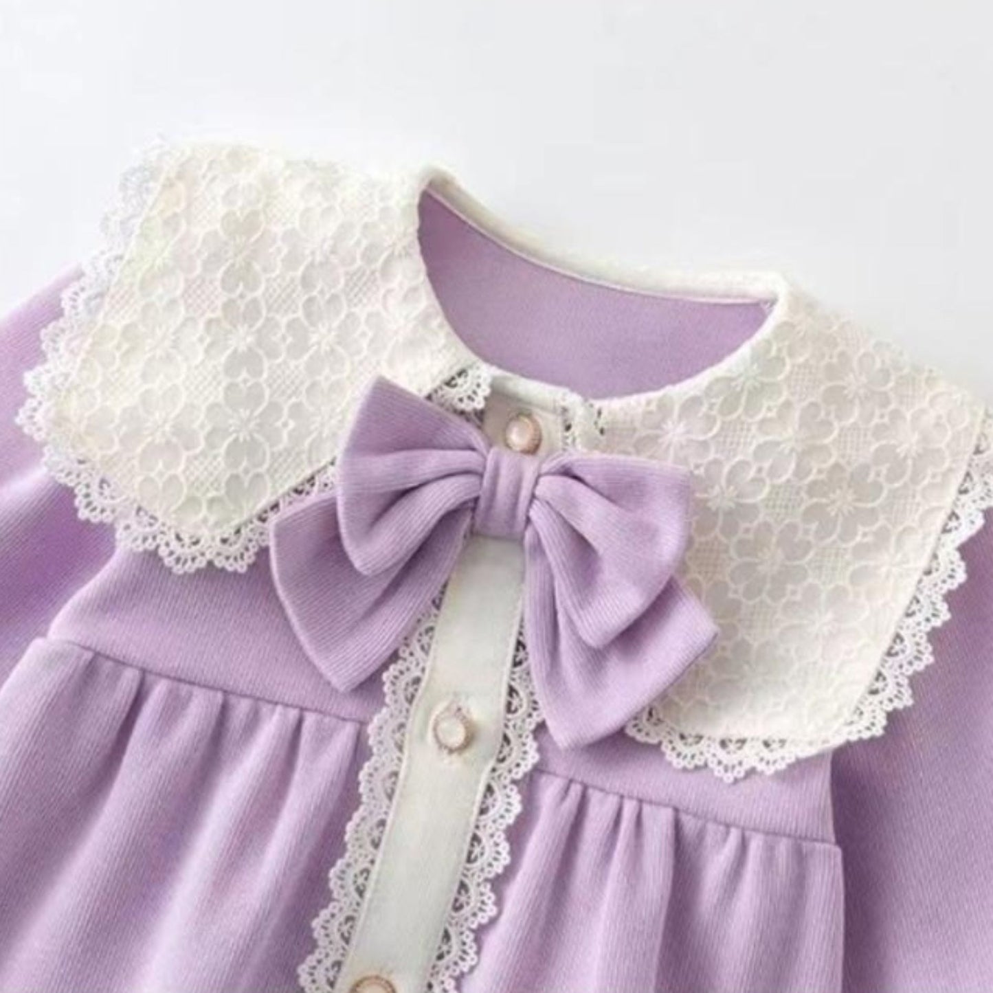 Cozy and stylish lavender romper for baby girls by Ju Ju Jam, complete with a cute matching cap for a charming look.