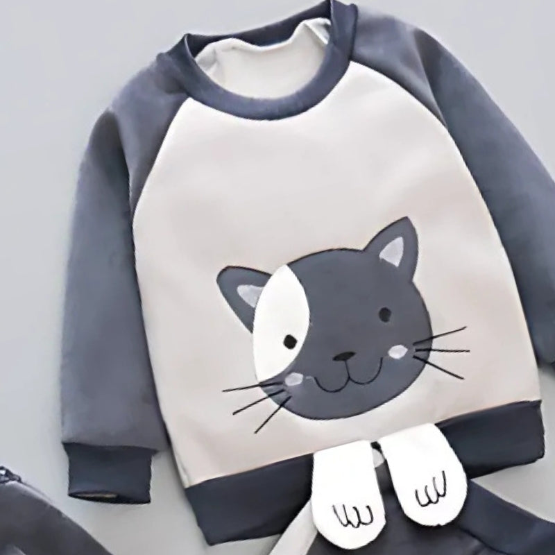 Warm boys and girls winter clothing set with a stylish jacket, matching pants, and comfortable top from Ju Ju Jam.