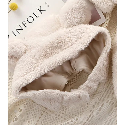 Mini Bear-themed baby romper with a cap for boys and girls, offering comfort and style, available at Ju Ju Jam.