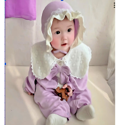 Soft lavender romper for baby girls from Ju Ju Jam, featuring a cozy design and a matching cap for a stylish and comfy outfit.