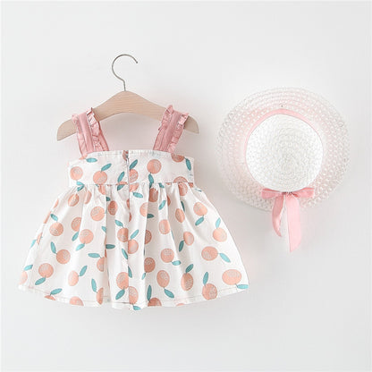 Adorable baby dress in pink and yellow with bow detail and hat