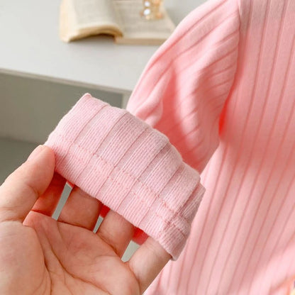 Ju Ju Jam Girls Sweater Top with Breathable Fabric and Pink Bow, perfect for layering and keeping your little one stylish and comfortable.