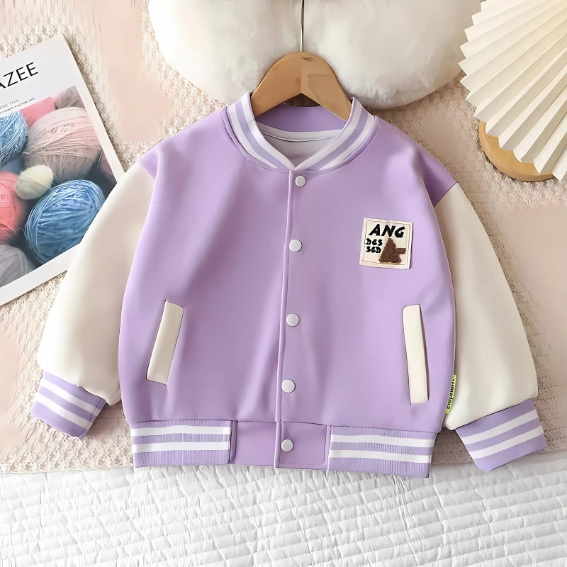 Pretty Purple Girls Bomber Jacket by Ju Ju Jam – a stylish and cozy jacket designed for your little fashionista.