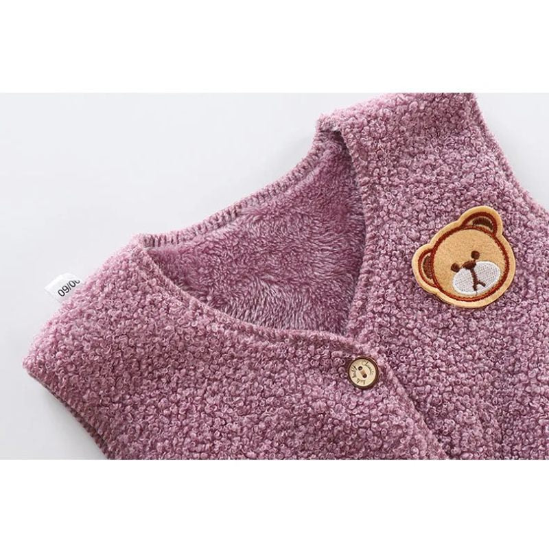 Ju Ju Jam’s Lovely Pink Bear Fleece Vest for girls – a cute and warm layer for your little one’s wardrobe.