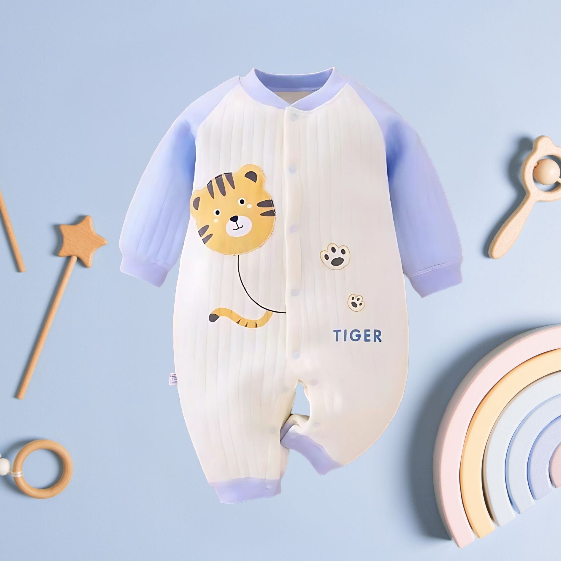 Playful Tiger Romper for babies by Ju Ju Jam – the perfect outfit for keeping your little one comfy and stylish.