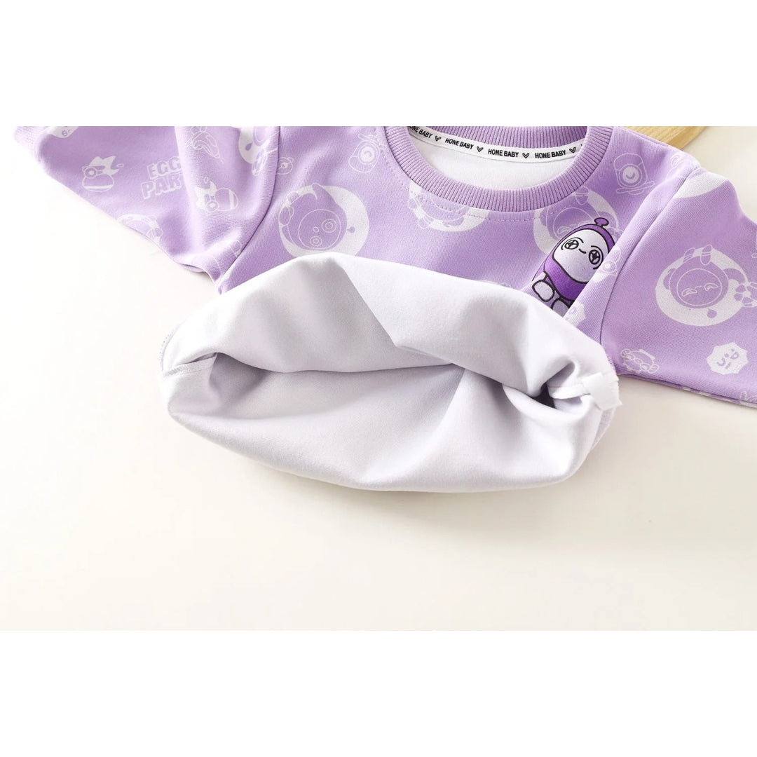 Front view of the Little Duckling Lavender T-shirt for kids, highlighting its charming design by Ju Ju Jam.