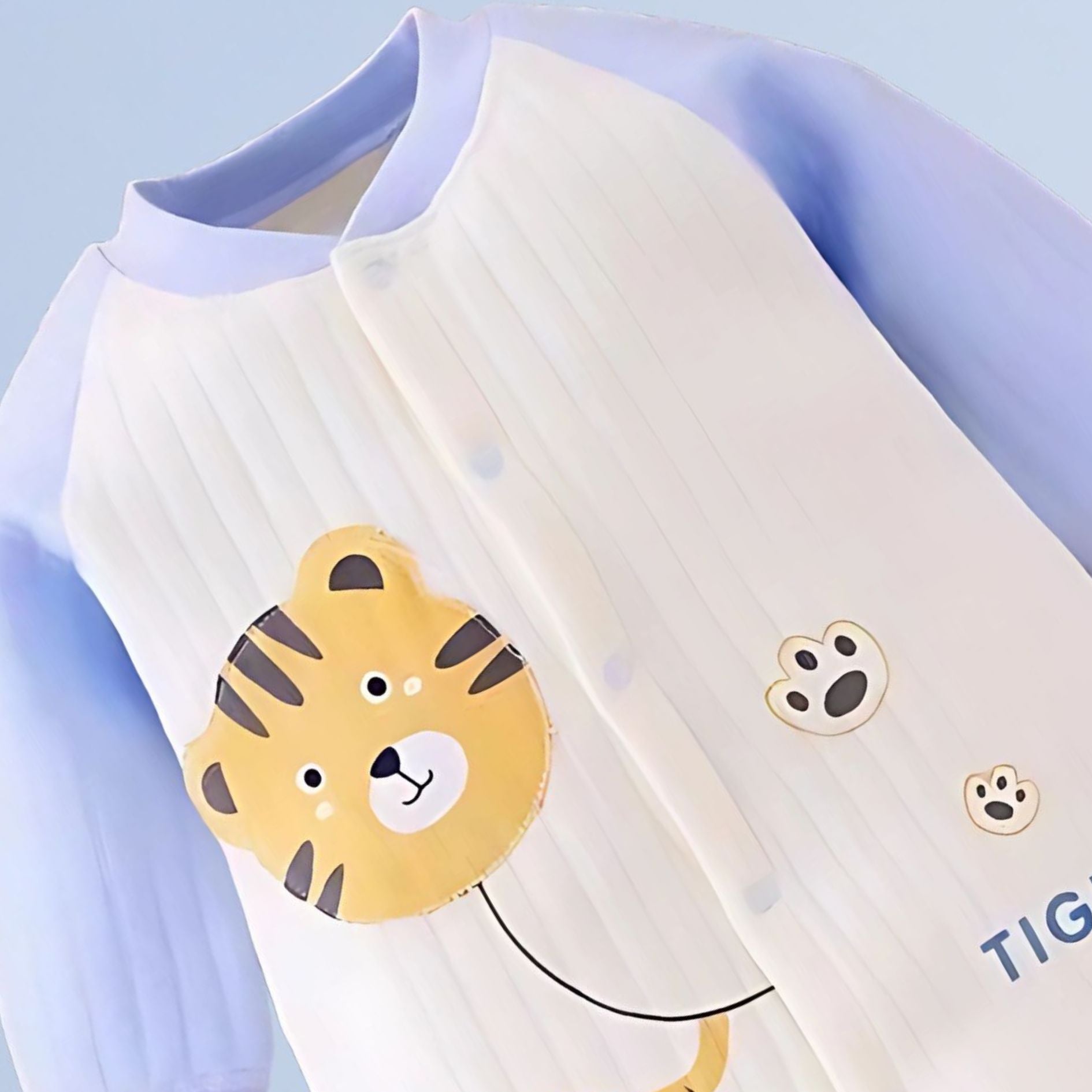 Ju Ju Jam’s Playful Tiger Baby Romper – a stylish and playful outfit for boys and girls, perfect for active little ones.