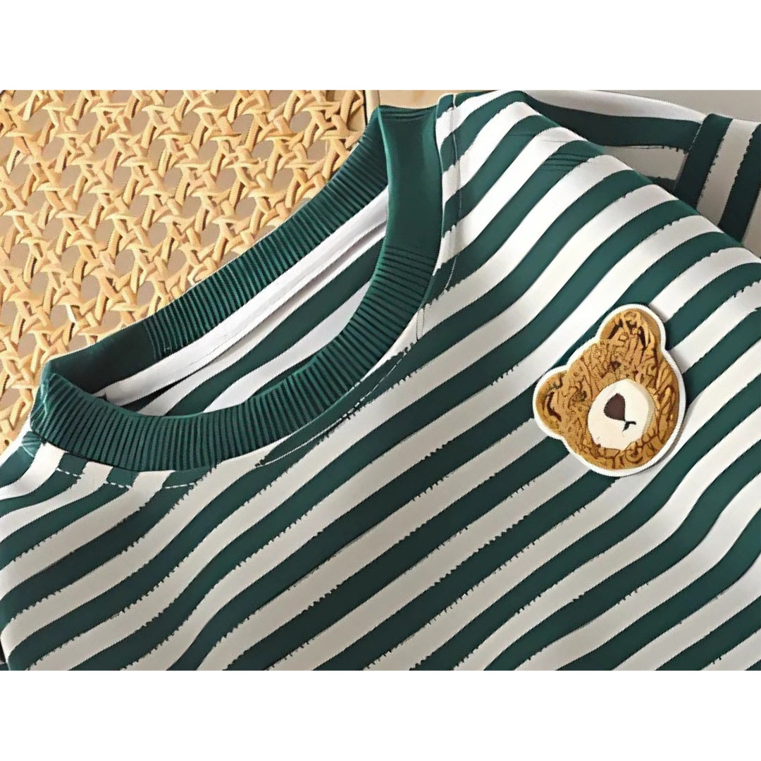 A neatly folded Mini Stripes Classic Boys T-shirt with a timeless design for boys, perfect for casual wear.