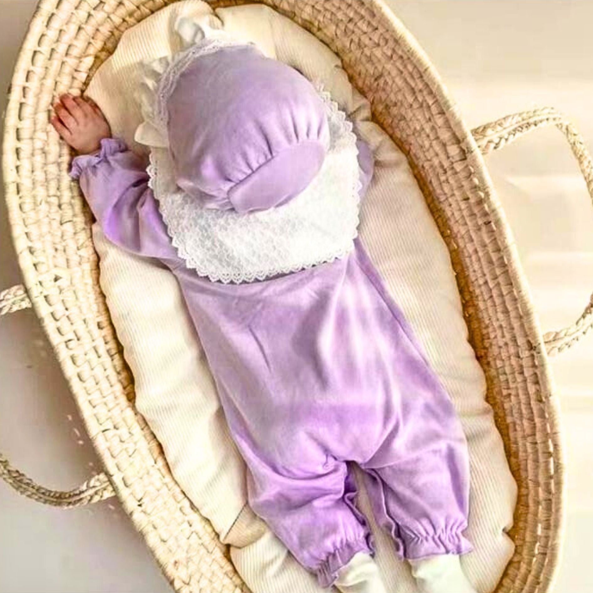 Lavender baby girls romper with cap from Ju Ju Jam, designed for cozy comfort and stylish flair, perfect for little ones.