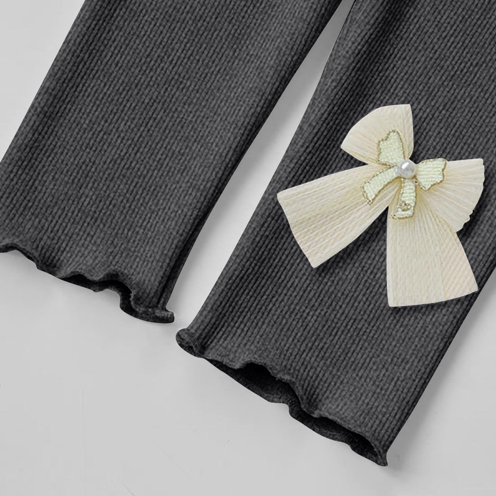 Ju Ju Jam girls' tights with a sweet bow accent, perfect for adding a touch of charm to any outfit.