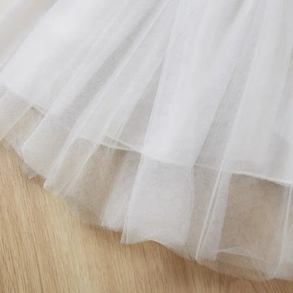 White Frill Princess Dress for girls by Ju Ju Jam, designed to create a fairy-tale look for any occasion.