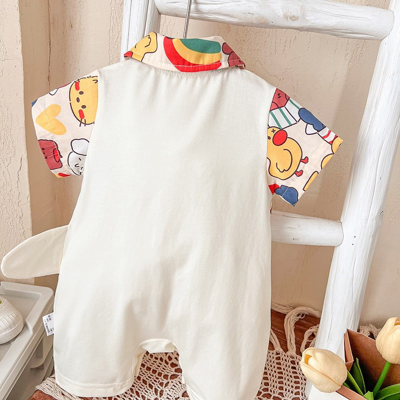 Smiling baby wearing Baby Jurassic Joy Romper – perfect for everyday adventure

