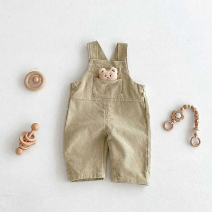 Ju Ju Jam baby corduroy jumpsuit with bear face – warm and playful outfit for boys and girls