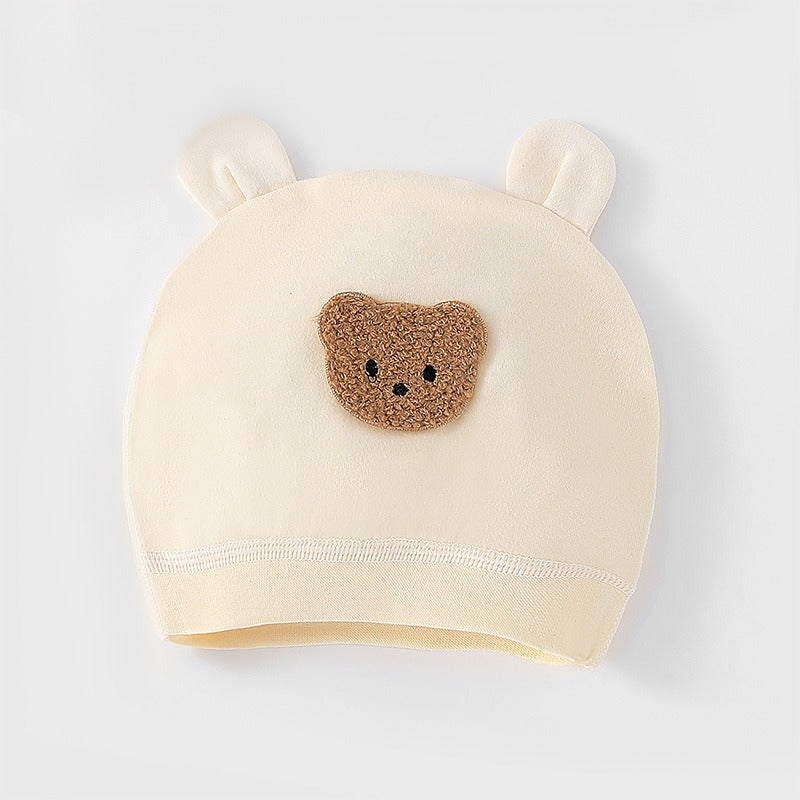 Adorable baby hat with bear ears – unisex design by Ju Ju Jam for boys and girls.

