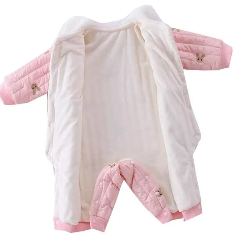 Ju Ju Jam pink baby romper for girls, combining a puffer design with a sweet bunny sling detail for added charm.