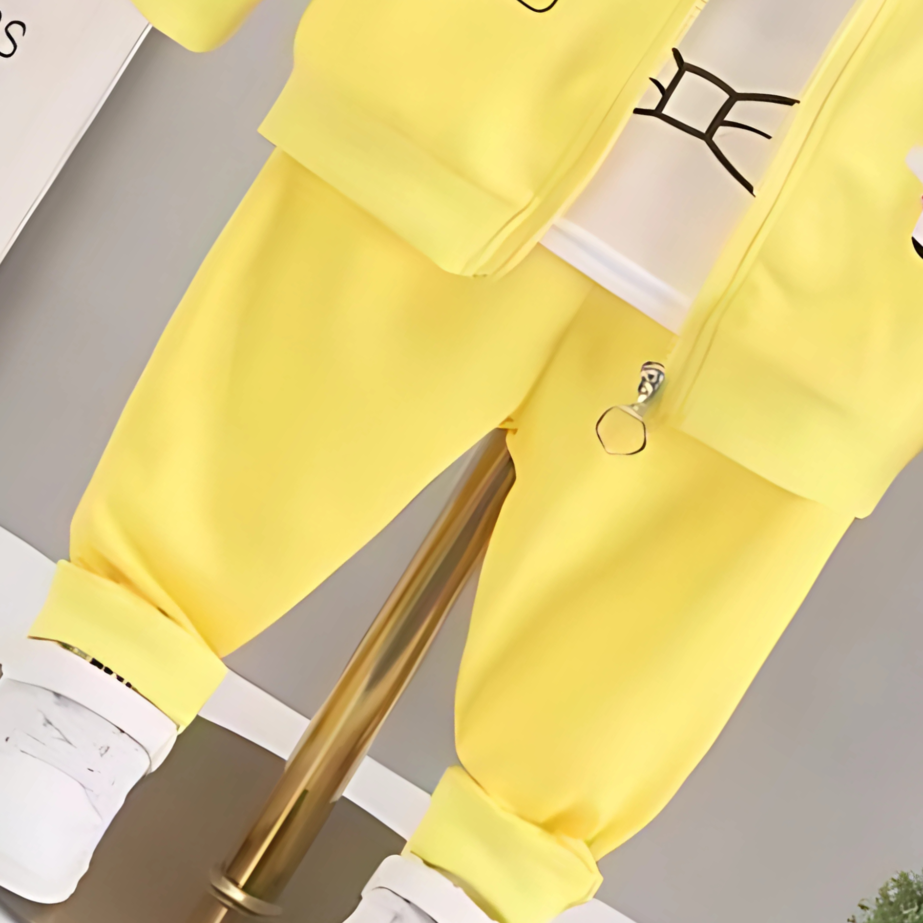 Little girl in Ju Ju Jam yellow three-piece set with 'Best Friend' design

