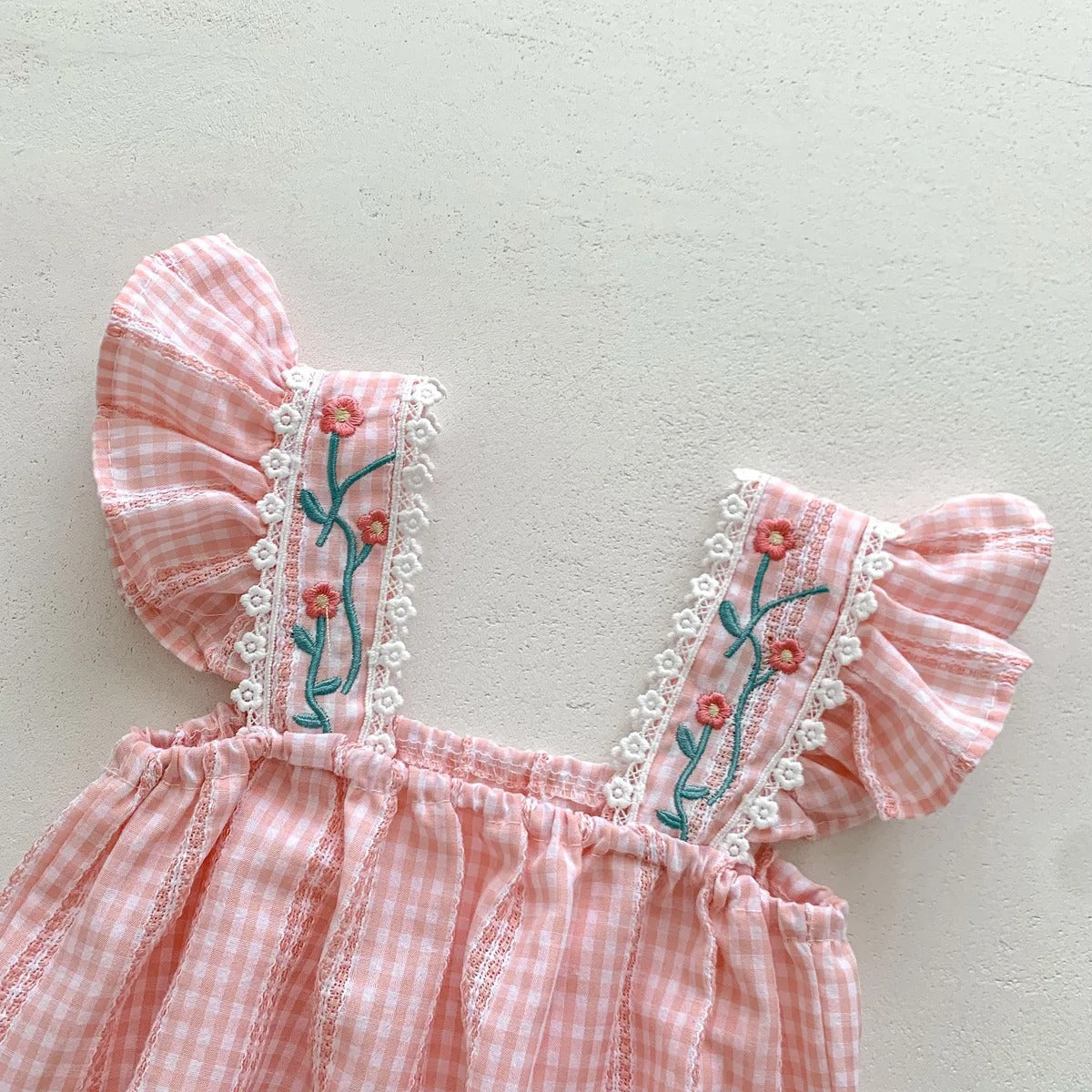 Adorable baby girl romper with floral print and bow headband – Bloom Bright by Ju Ju Jam