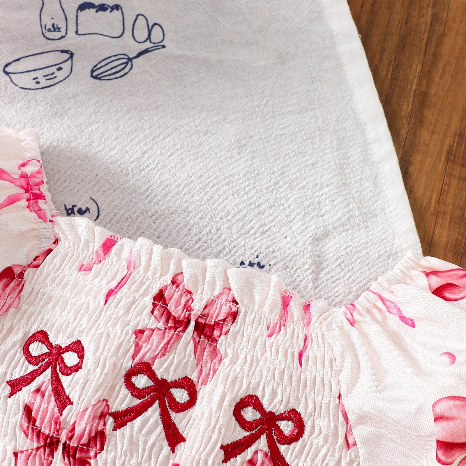 Ju Ju Jam Bow Belle Romper Set featuring delicate bows and ruffle details

